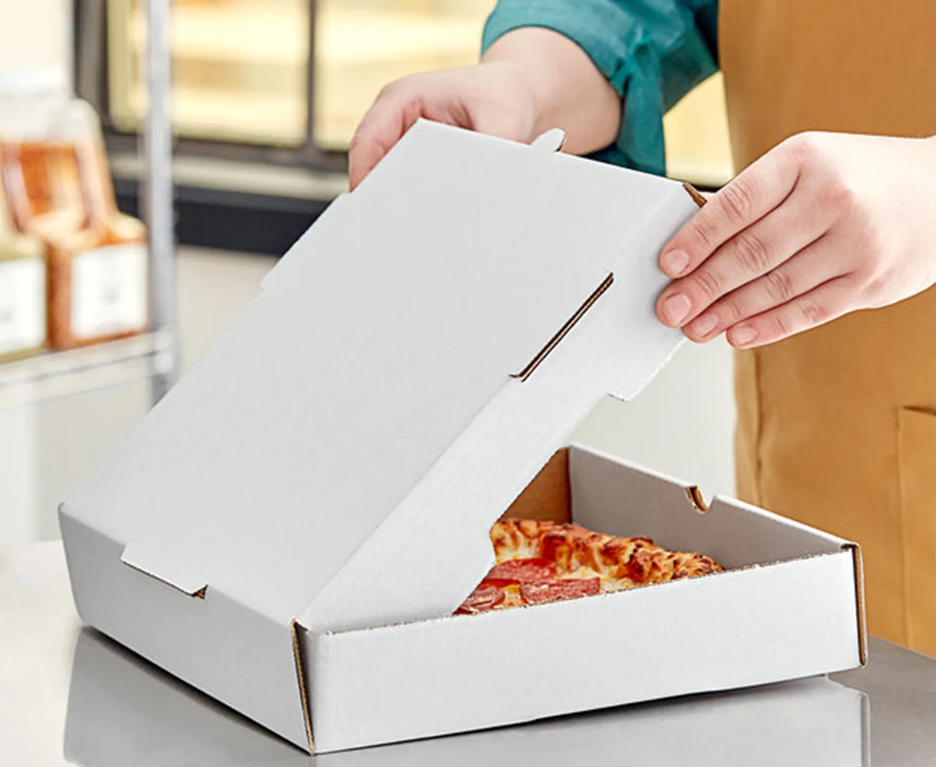 Het materiaal van de op maat gemaakte pizzadoos.